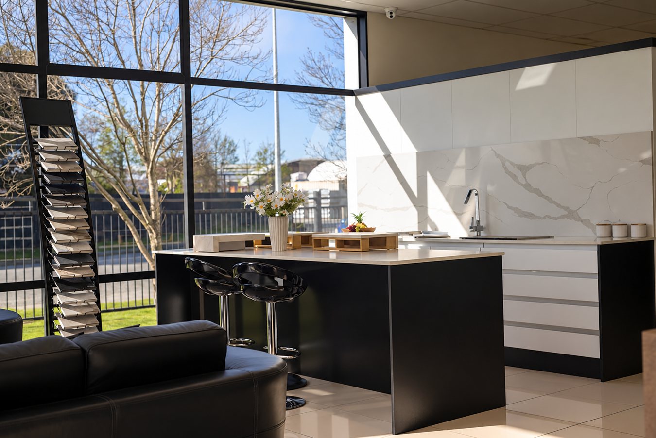 Surface samples and a kitchen display at the EONStone showroom.